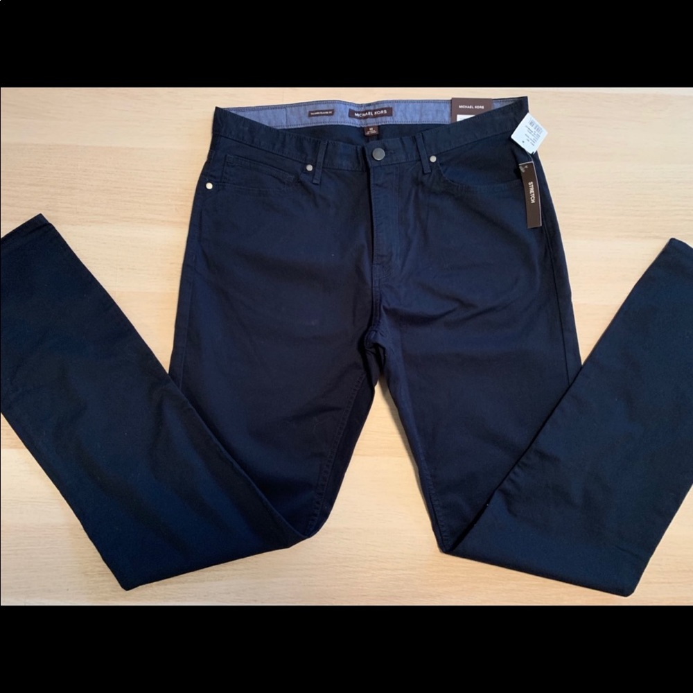 NWT. Men’s Michael Kors Navy pants. 32x34.
